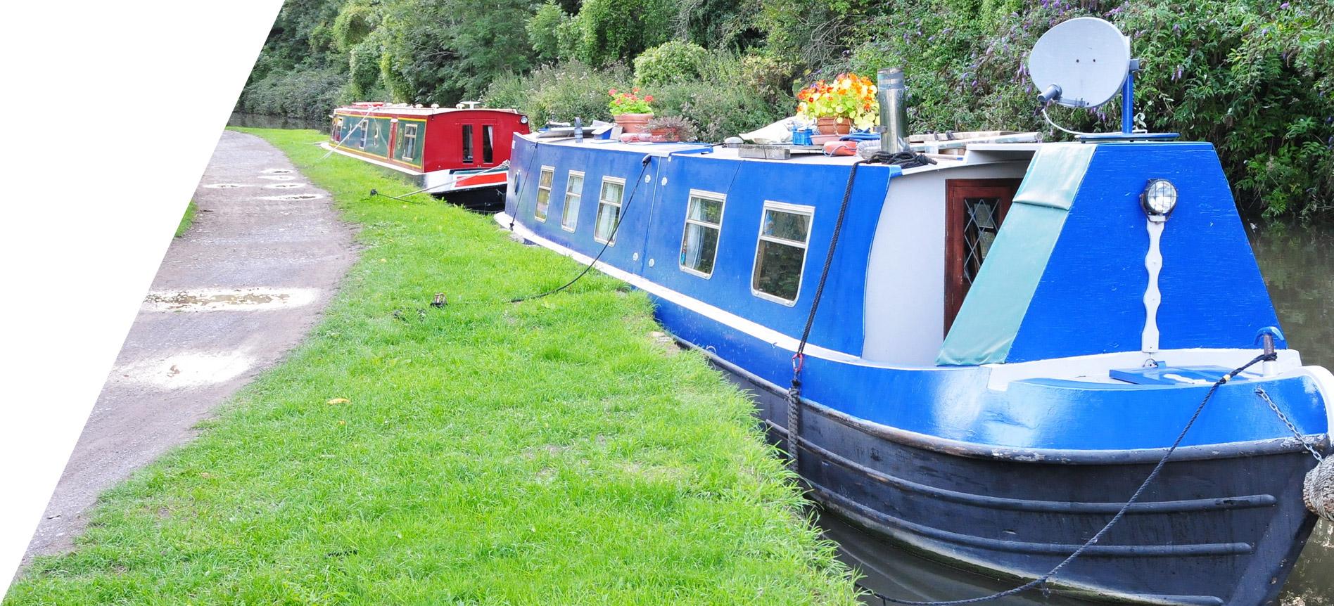 houseboats moored at canal edge
